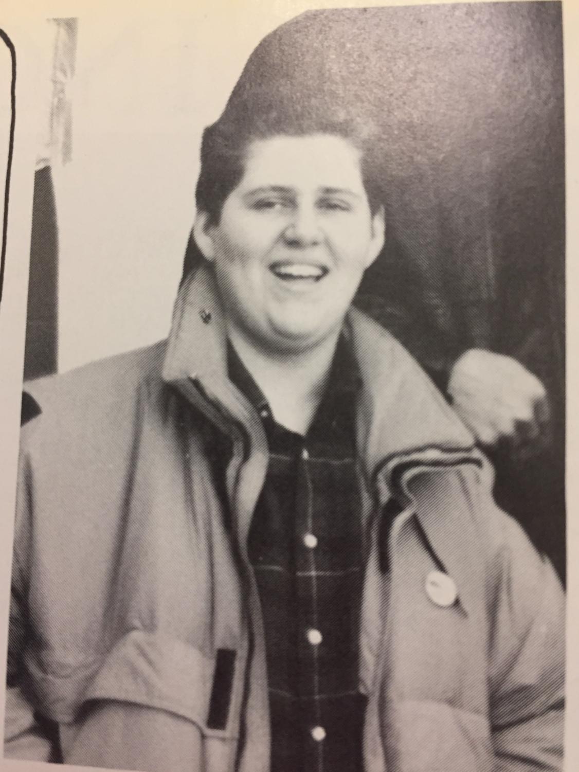 ALWAYS LAUGHING: Mandel ‘88 as a high school senior (left); Mandel poses with his 2017 Emmy for Best-Comedy, Veep (right).