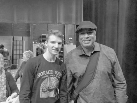 Baseball Player Bernie Williams performs with steel band in concert