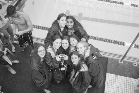 Girls varsity swim team ends undefeated season with a splash