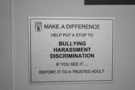 School targets bullying with bathroom signs