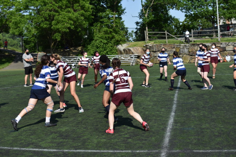 Girls rugby team goes undefeated against Harvey