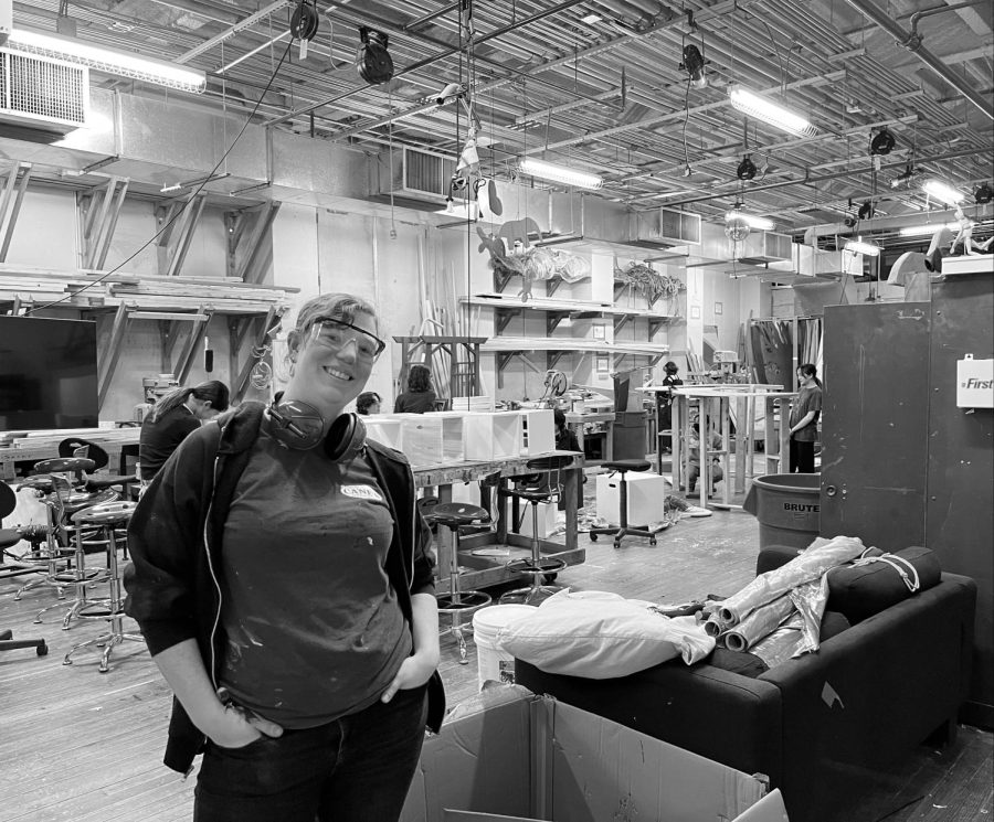 Courtesy of Ben Rafal/Photo Director, 
HARD AT WORK Miller poses in front of the workshop